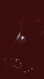 Low angle view of illuminated ceiling