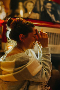 Smiling woman wearing sweater