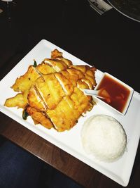 Close-up of serving food in plate