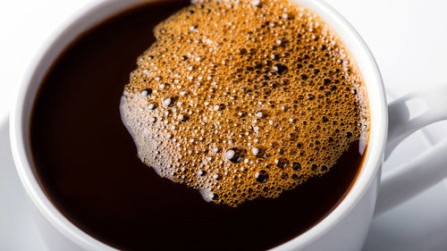 High angle view of coffee cup on table