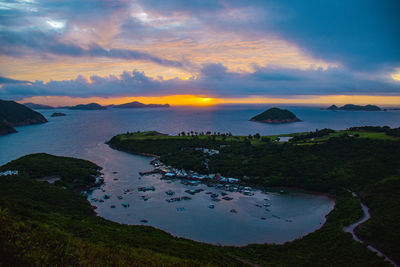 Scenic view of sea against sky at sunset