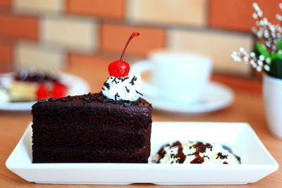 Close-up of cake served on table