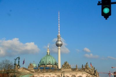 Berlin cathedral and fernsehturm against blue sky