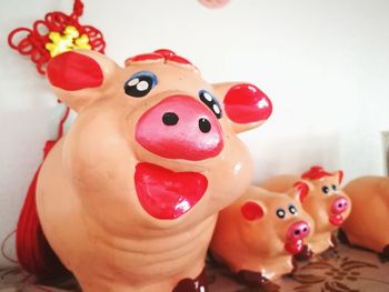 High angle view of pig figurines