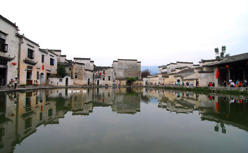 Reflection of buildings in lake