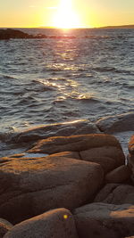 Scenic view of sea at sunset