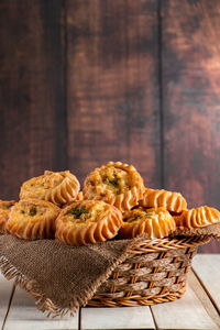 Close-up of food on wicker basket on table