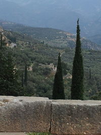 Scenic view of sea with mountain range in background