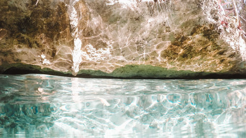 Close-up of rocks in swimming pool