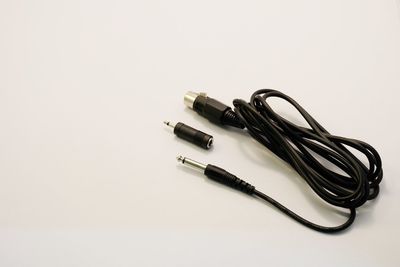 High angle view of audio cable on gray background