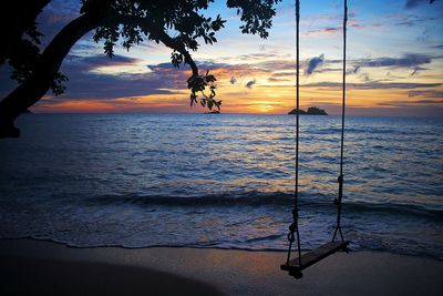 Scenic view of sea at sunset