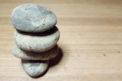 Close-up of stone stack on table