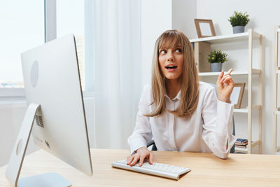 Young businesswoman working at office