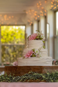 Full frame view of a wedding cake and decorations before the ceremony and reception