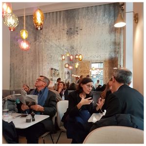 People sitting in illuminated room