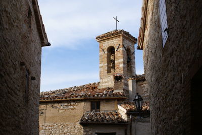 Low angle view of old building against sky