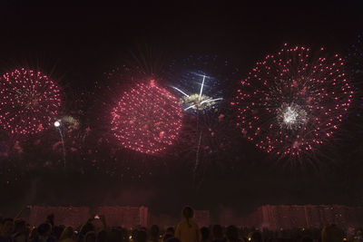 Firework display at night