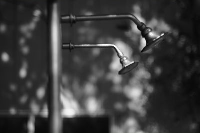 Close-up of illuminated light against sky