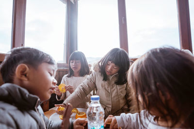 Mother and daughter at restaurant