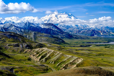 Scenic view of snowcapped mountains against sky