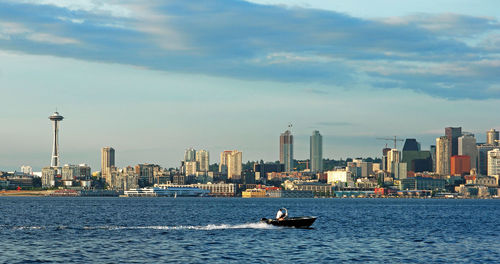 City skyline with sea in background