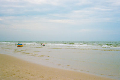 Scenic view of beach against sky