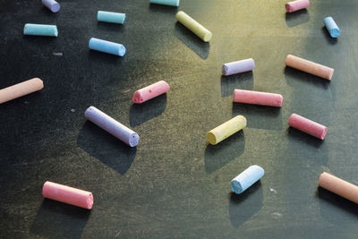 High angle view of colorful chalks on table