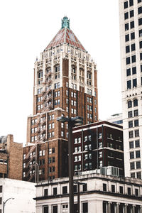 Low angle view of skyscraper against sky