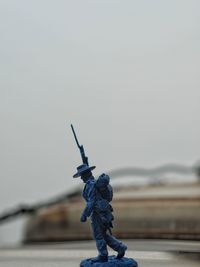 Close-up of statue against clear sky