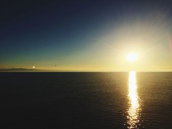 Scenic view of sea at sunset