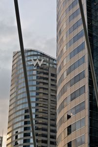 Low angle view of skyscrapers against sky