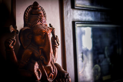 Close-up of ganesha statue in temple