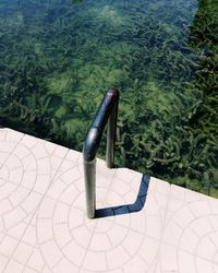 High angle view of swimming pool by lake