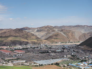 High angle view of buildings against sky