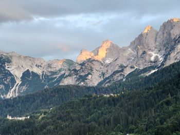 Scenic view of landscape and mountains against sky