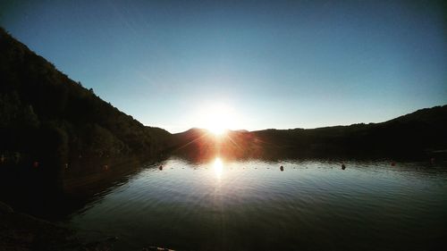 Scenic view of lake against clear sky