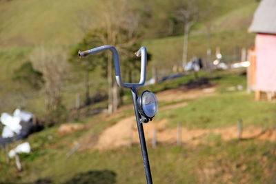 Close-up of bicycle on field