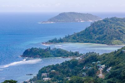 Scenic view of sea and mountains