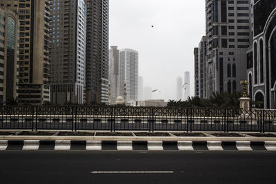 Modern cityscape against sky