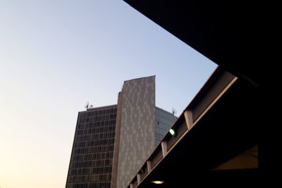 Low angle view of buildings against clear sky