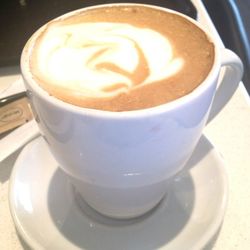 Close-up of cappuccino on table