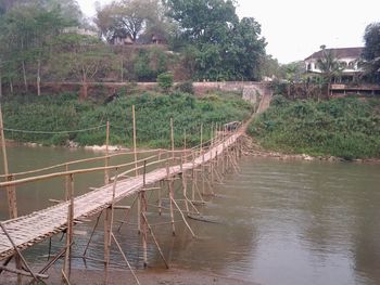 View of canal along trees