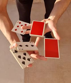 Cropped hands of woman holding gift box