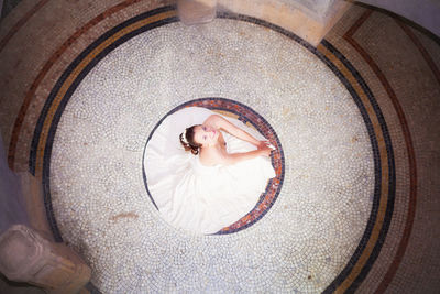 Directly above shot of woman lying down
