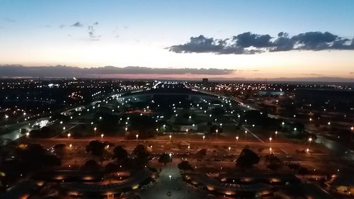 Aerial view of illuminated cityscape at night