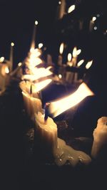 Close-up of burning candles