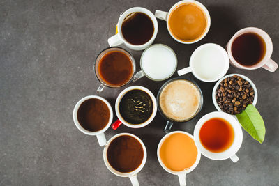 High angle view of tea and coffee on table