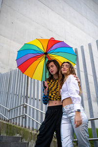 Portrait of woman holding umbrella