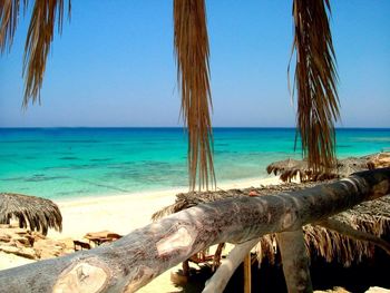 Scenic view of sea against blue sky