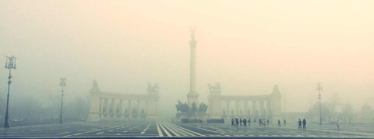 architecture, built structure, building exterior, fog, foggy, copy space, weather, travel destinations, tower, city, tall - high, famous place, travel, international landmark, tourism, sky, capital cities, day